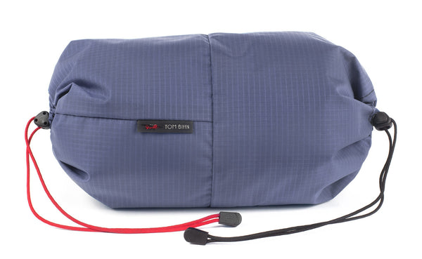 An Aeronaut 30 Travel Laundry Stuff Sack in Dusk (purplish-blue with light blue grid) 210 Cerylon.